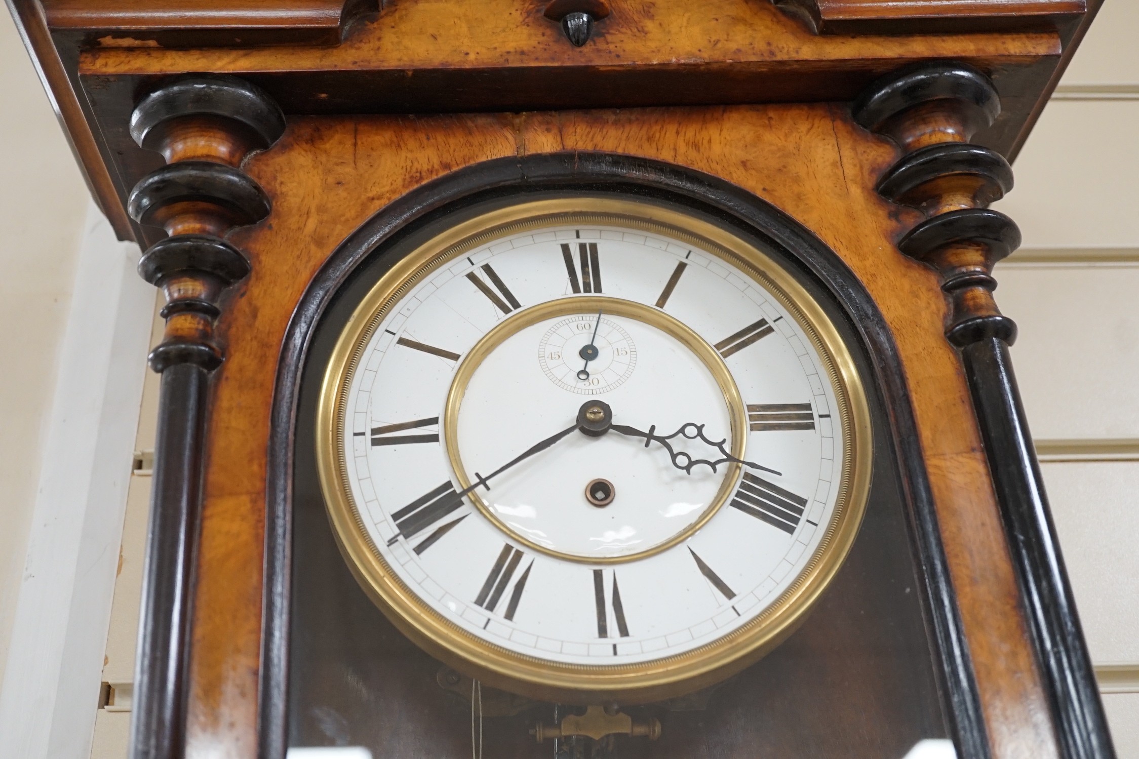 A walnut and ebony cased Vienna wall clock, 130cms high